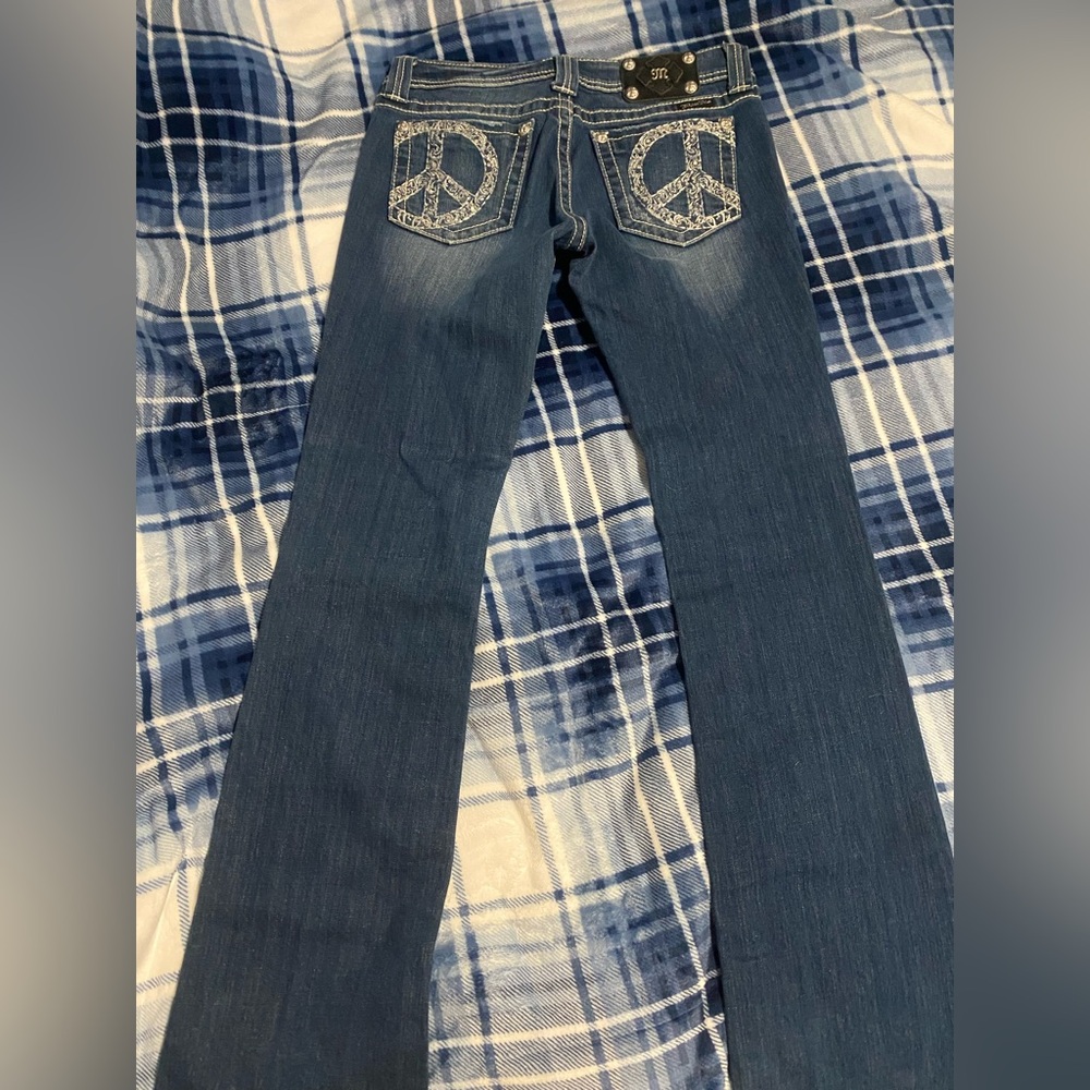 Women's Blue Jeans with Embroidered Peace Sign Pockets